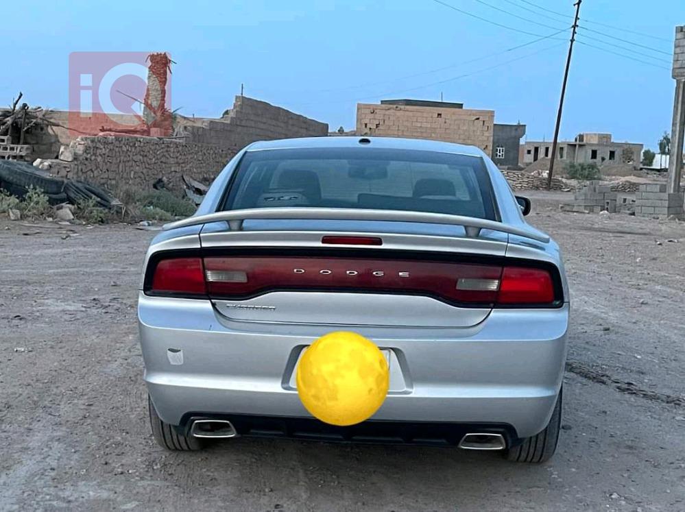 دۆج چارجەر